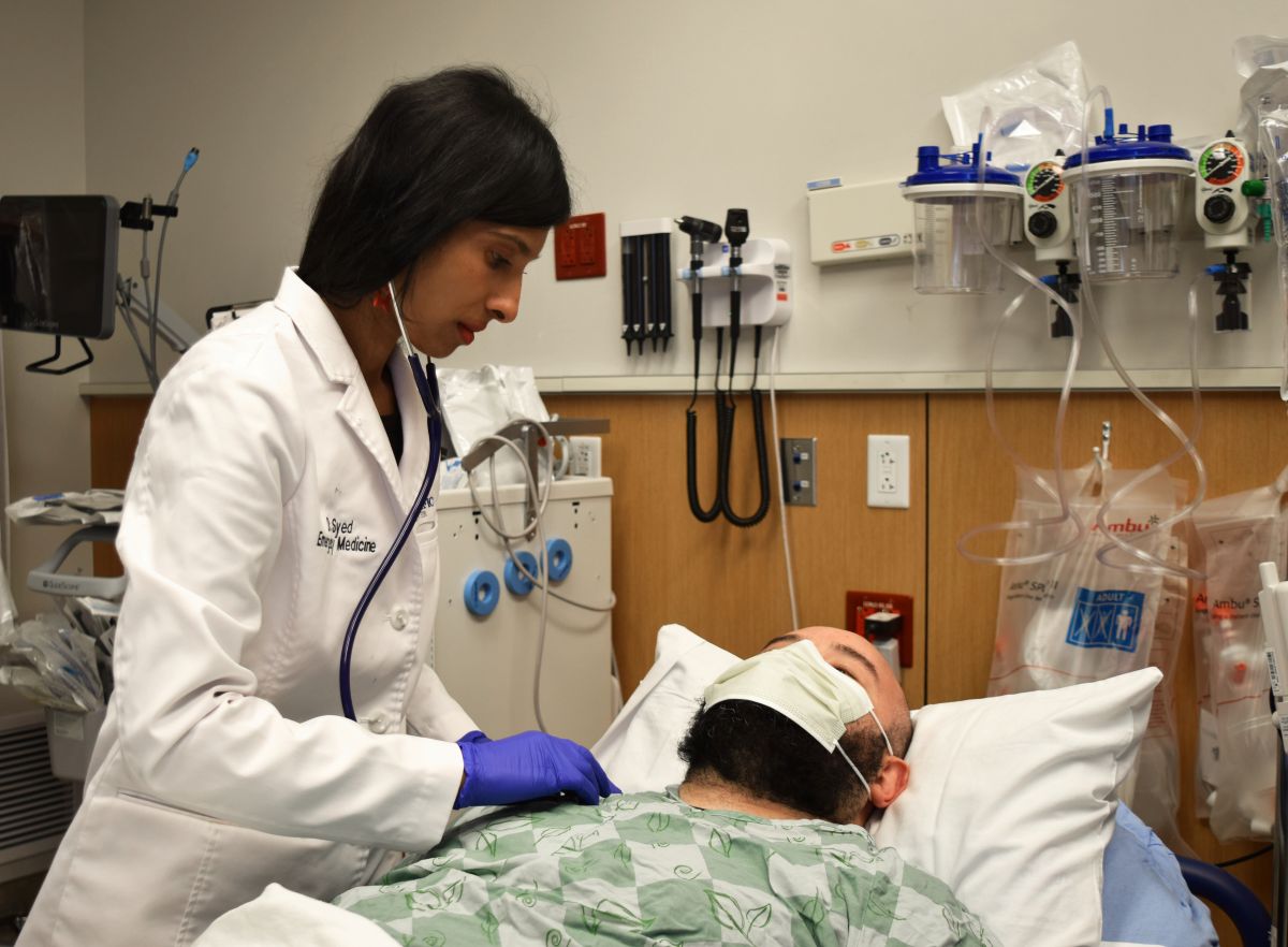 Dr. Mimi Syed with a Patient